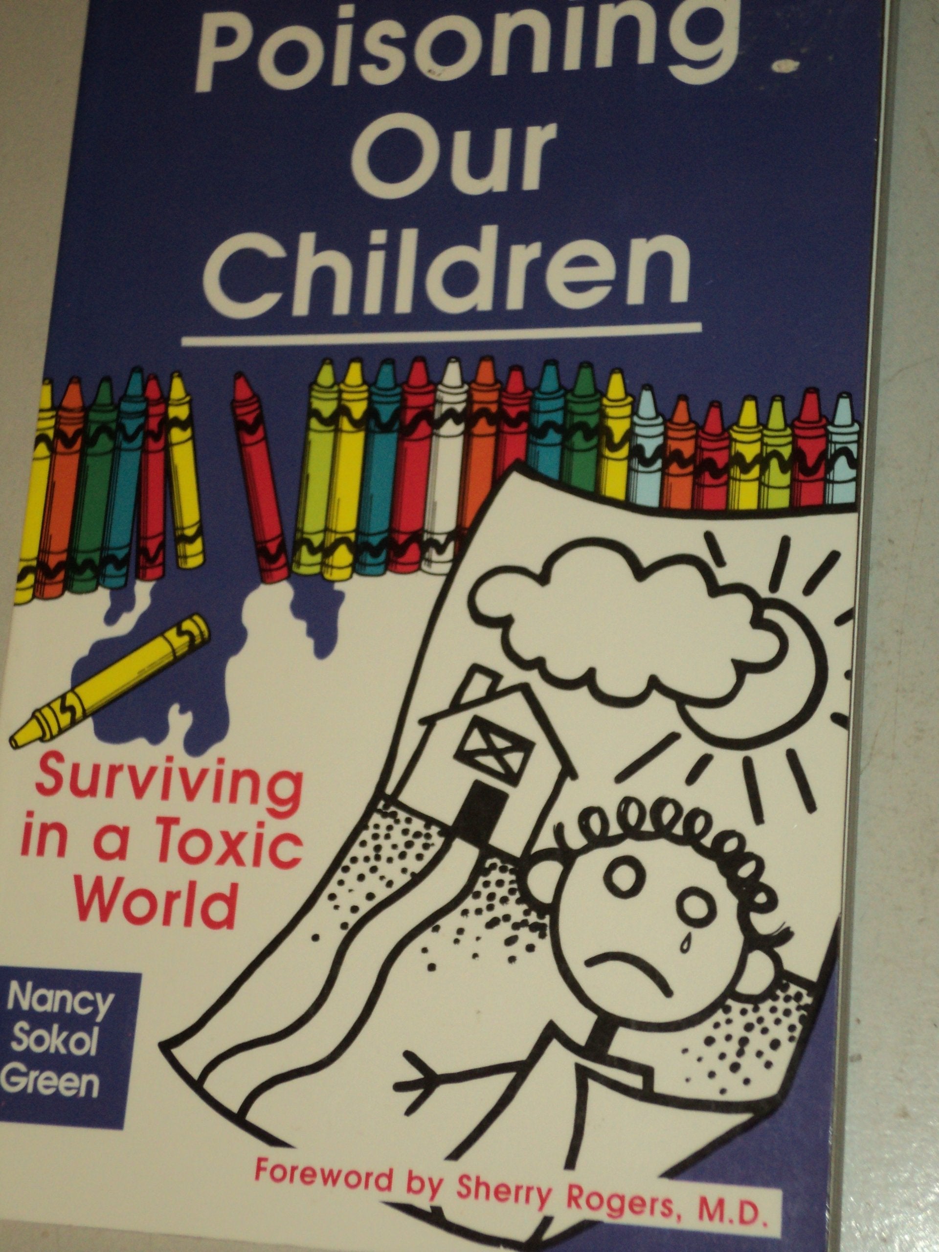 Poisoning Our Children: Surviving in a Toxic World,Used
