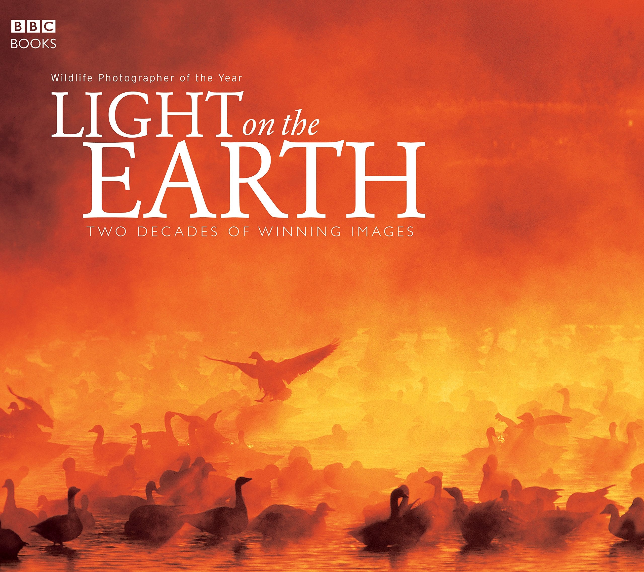 Light on the Earth: Two Decades of Winning Images (Wildlife Photographer of the Year),Used