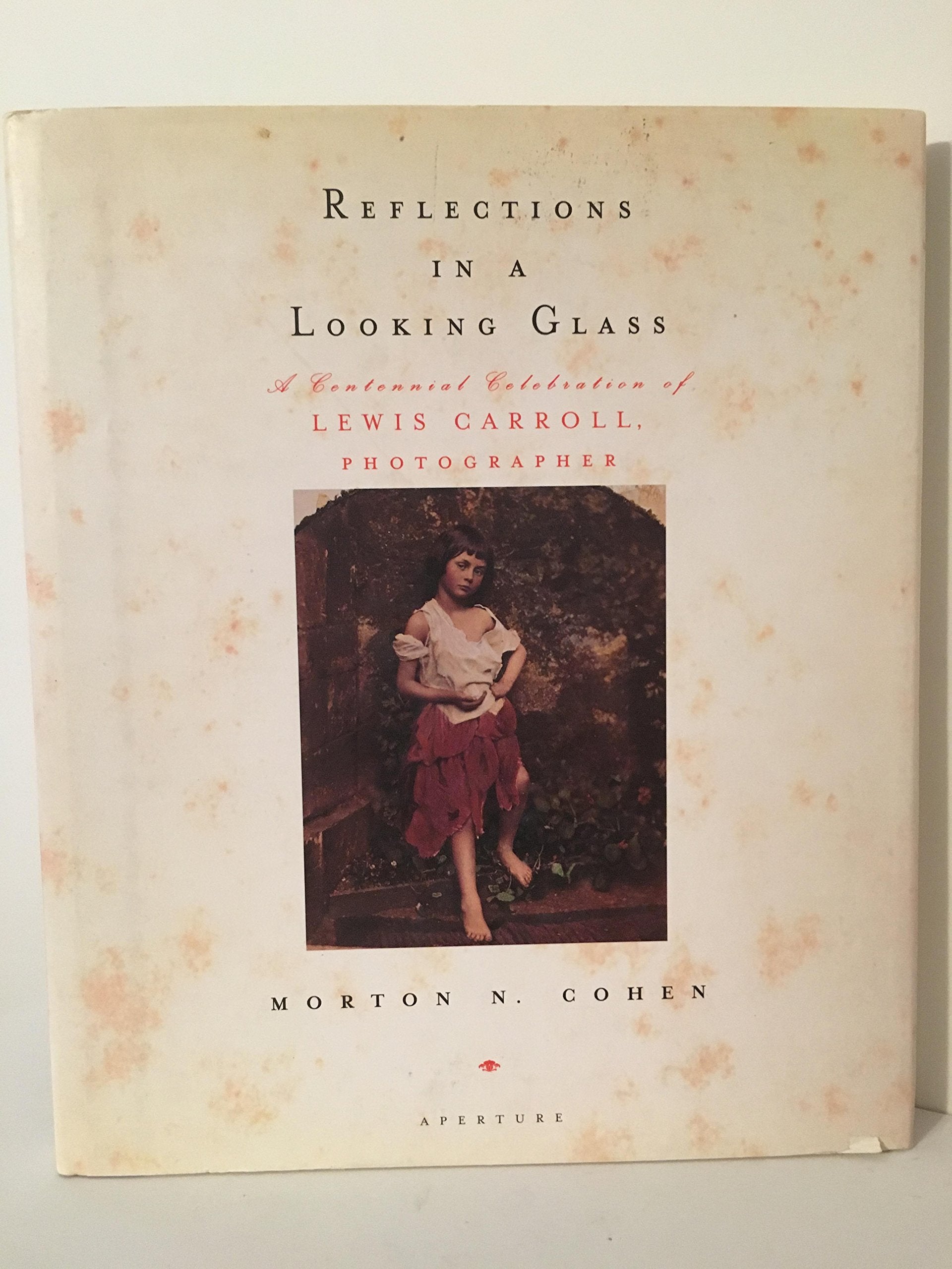 Reflections in a Looking Glass: A Centennial Celebration of Lewis Carroll, Photographer,Used