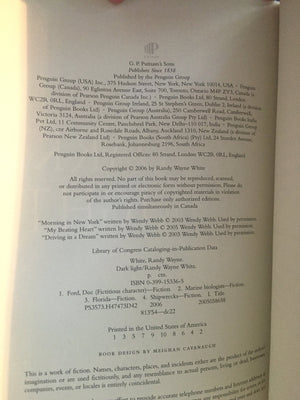 Dark Light (Doc Ford Novels)-used