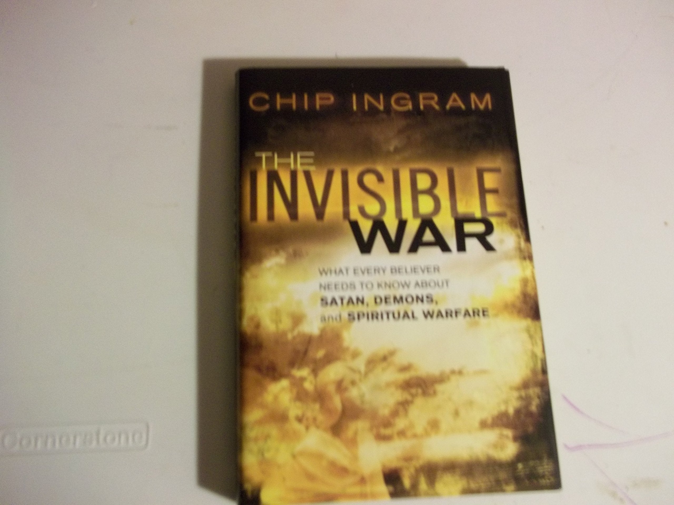 Invisible War, The: What Every Believer Needs To Know About Satan, Demons, And Spiritual Warfare,New