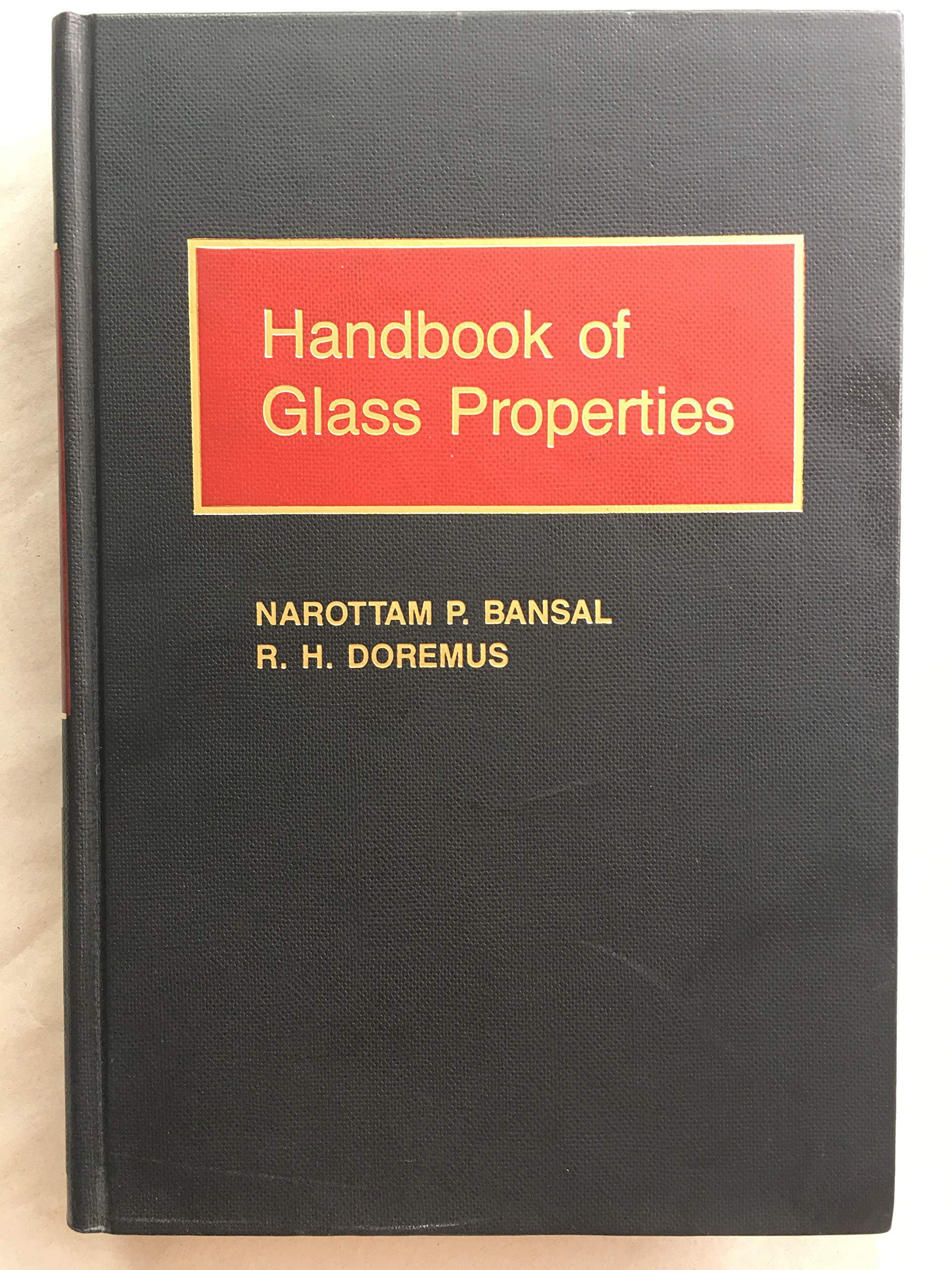 Handbook of Glass Properties (Academic Press Handbook Series),Used